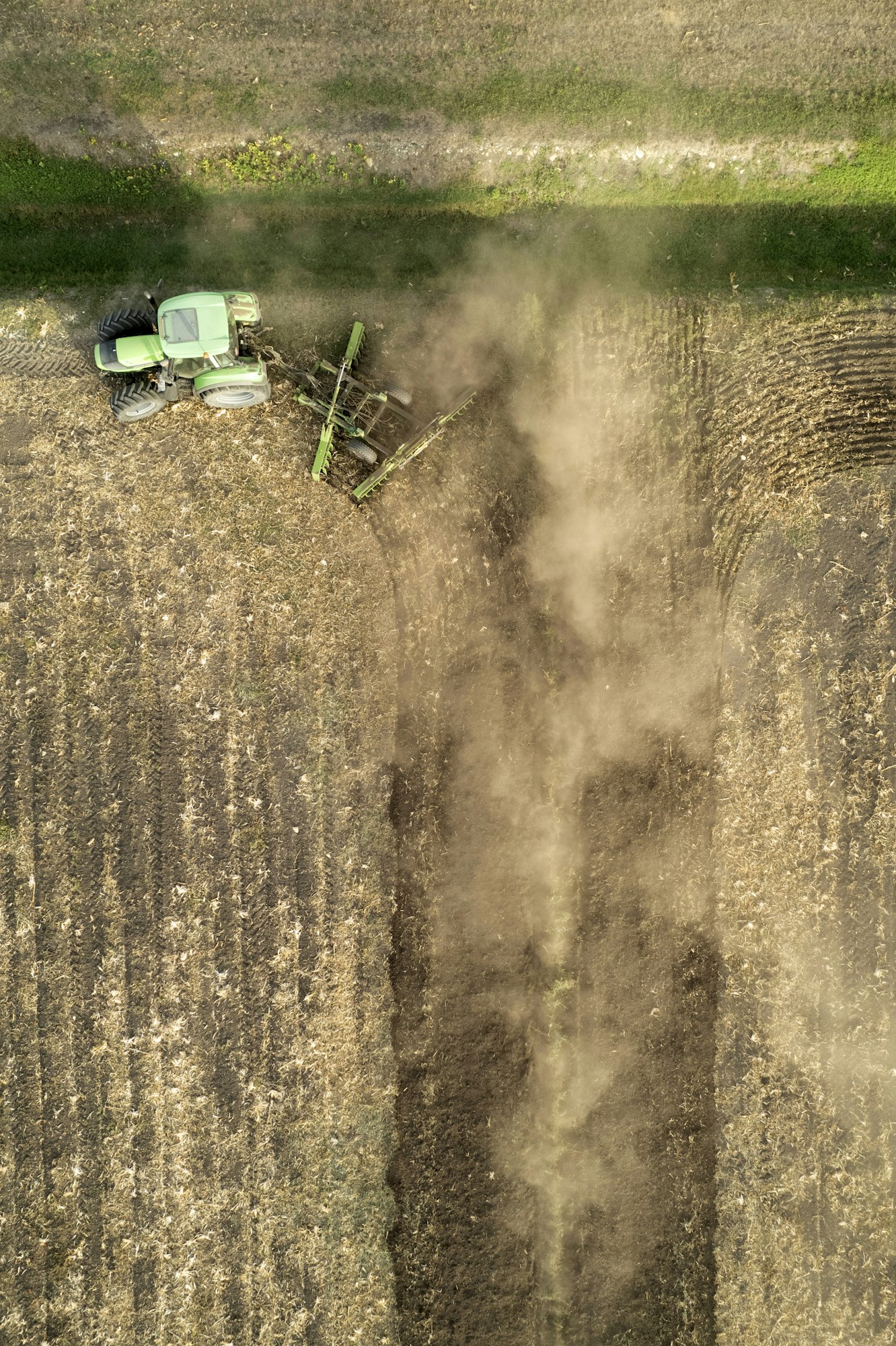Aerial view of a tractor at the time of winter soil preparation